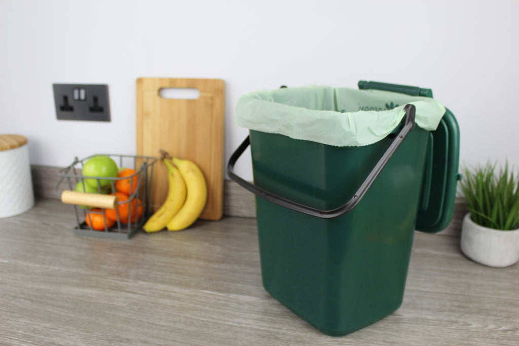 Large green food waste caddy with All-Green 10L compostable bag, ideal for eco-friendly waste disposal and odour control.