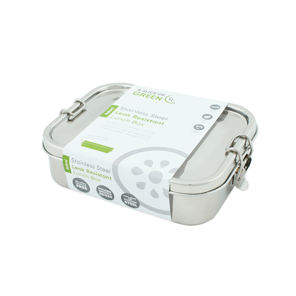 Stainless steel leak-resistant lunch box by A Slice of Green, shown in retail packaging with secure clips and product details visible