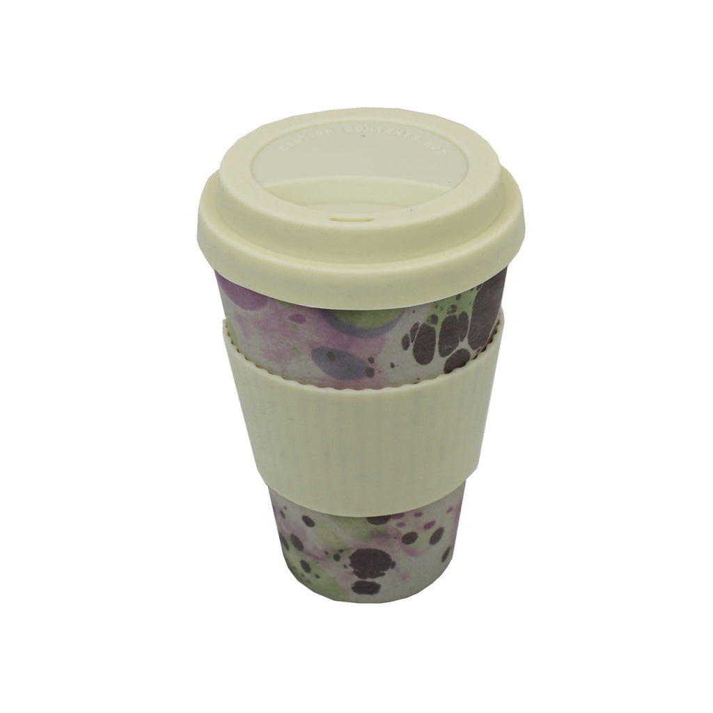 Eco-friendly bamboo travel cup with cream lid and grip, shown from above with marble pattern