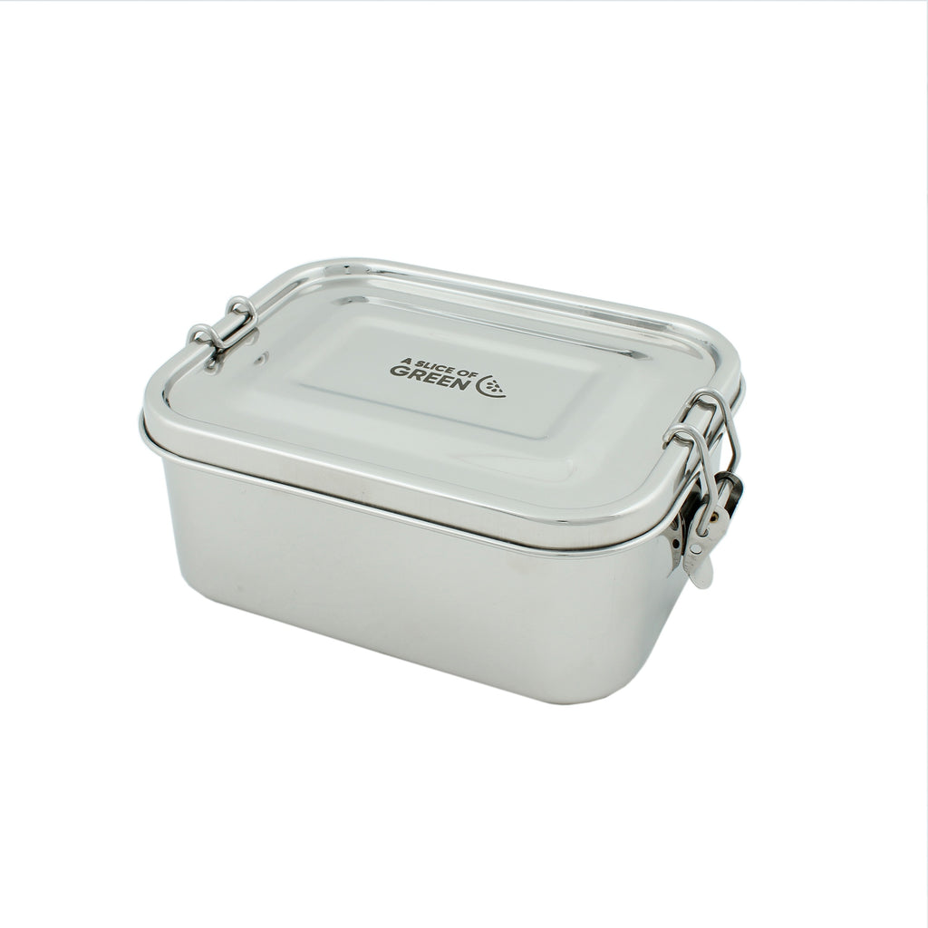 Rectangular stainless steel lunch box with secure metal clips and 'A Slice of Green' logo on the lid, set against a white backdrop