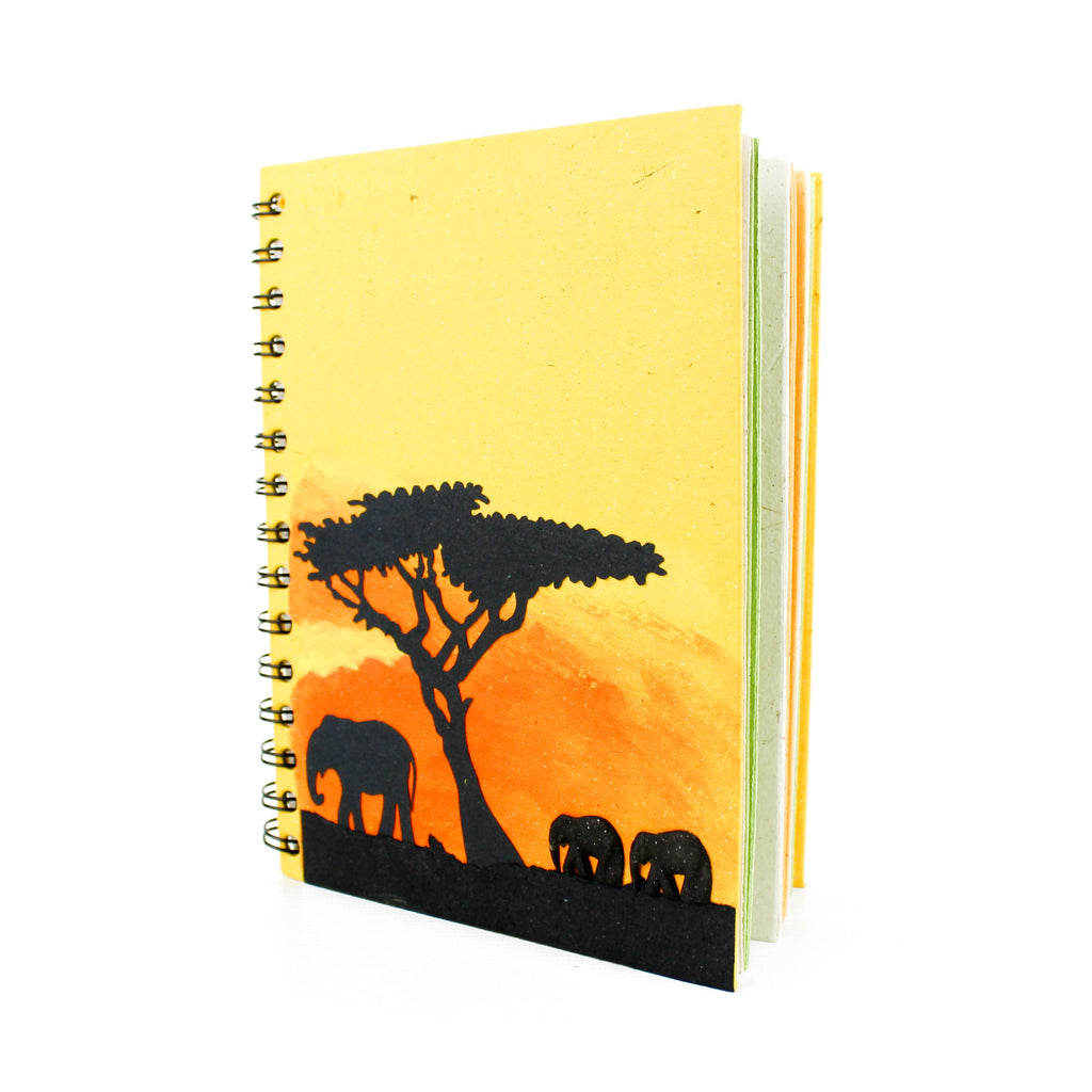 spiral yellow and red notebook with natural prints