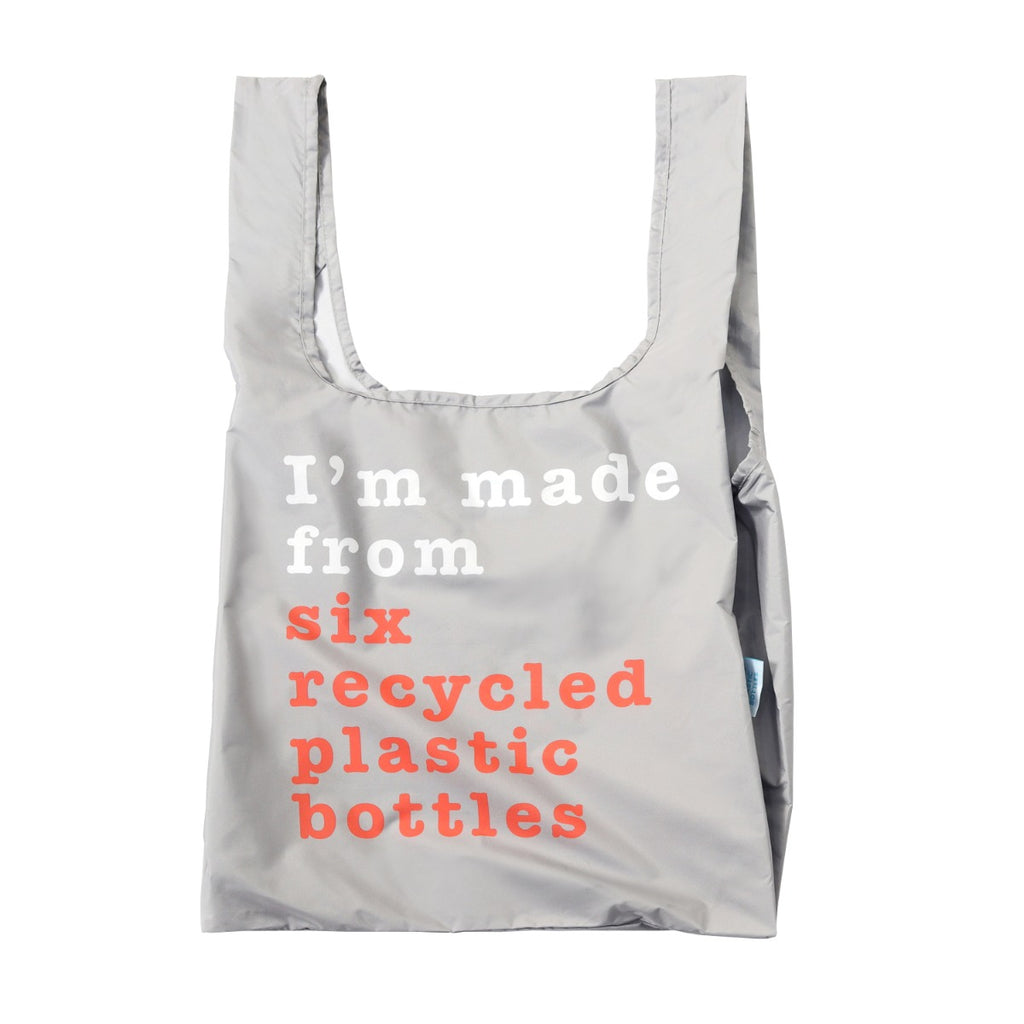 Open shopping bag with text about how it is made