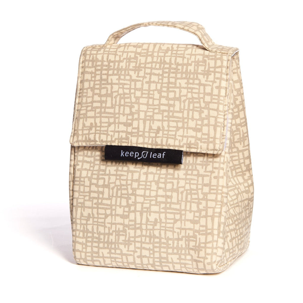Beige mesh like printed lunch bag, with top carrying handle, ideal for schools and workplaces alike