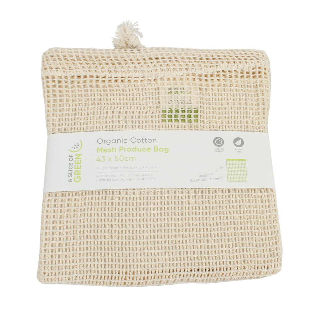 Folded organic cotton mesh produce bag with drawstring, wrapped in A Slice of Green packaging