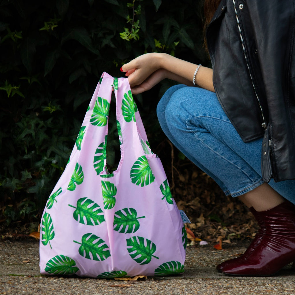 A full palm patterned shopper on the floor