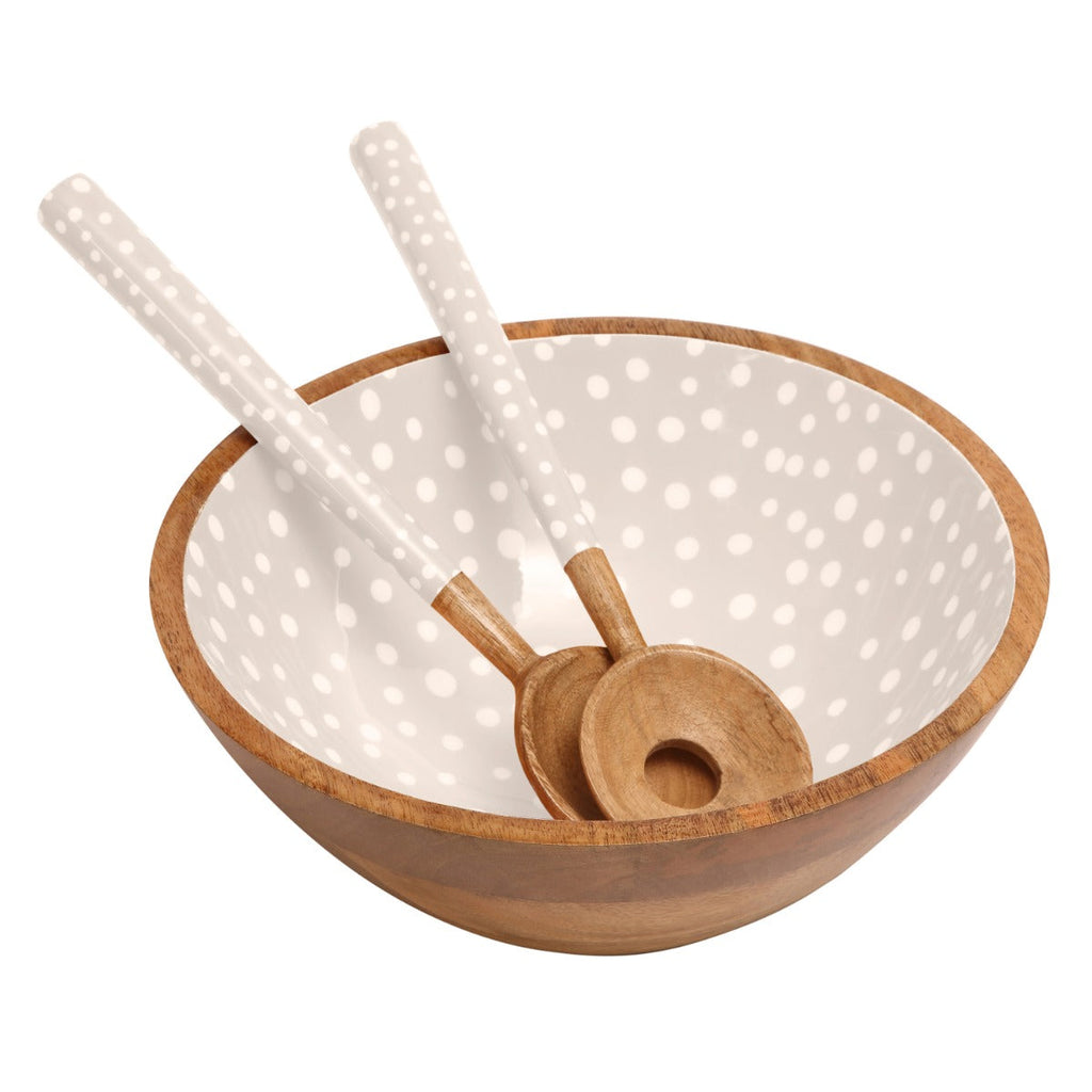  featuring white polka dots on a stone coloured background.