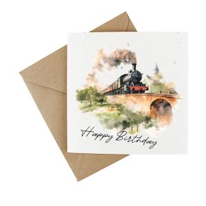 Happy birthday card made from wildflower seeded paper, featuring an british steam train puffing over a bridge. Presented with a kraft envelope.