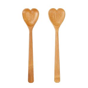 Heart shaped salad servers made from bamboo.
