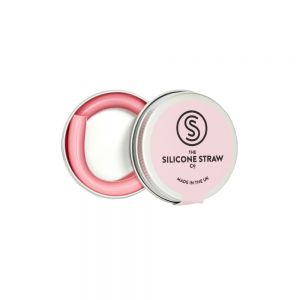 Pink reusable silicone straw presented in a handy little travel tin.